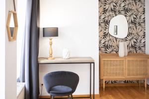 Posezení v ubytování ColmarAppart Vauban avec Spa