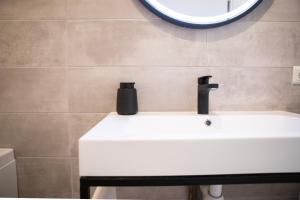 Koupelna v ubytování ColmarAppart Vauban avec Spa