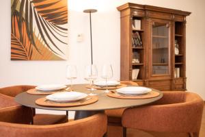 Posezení v ubytování ColmarAppart Vauban avec Spa