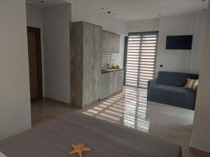 מטבח או מטבחון ב-Luana Monte Apartments