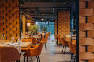 Reštaurácia alebo iné gastronomické zariadenie v ubytovaní Platinum Mountain Hotel&SPA