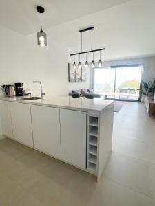 Kuchyňa alebo kuchynka v ubytovaní Pure South Residence
