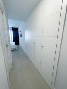 Posteľ alebo postele v izbe v ubytovaní Pure South Residence