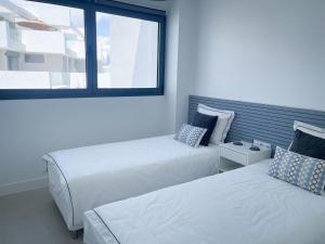 Posteľ alebo postele v izbe v ubytovaní Pure South Residence