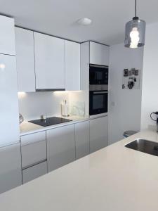Kuchyňa alebo kuchynka v ubytovaní Pure South Residence