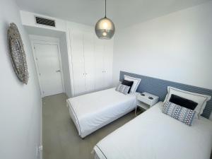 Posteľ alebo postele v izbe v ubytovaní Pure South Residence