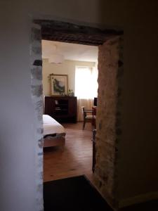 a room with a bedroom with a bed and a window at Appart rénové - 10 minutes à pied de la cathédrale in Quimper