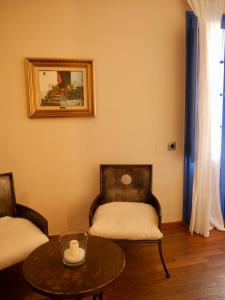 Posezení v ubytování Hostal de la Plaça - Hotel Boutique