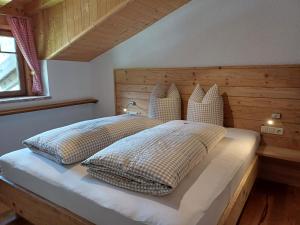 Postel nebo postele na pokoji v ubytování Haus Petra
