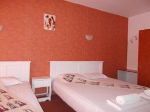 Postel nebo postele na pokoji v ubytování Art Guest House Orchidea