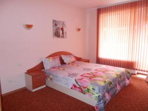 Postel nebo postele na pokoji v ubytování Art Guest House Orchidea