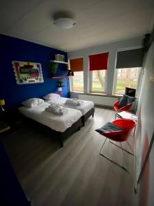 Postel nebo postele na pokoji v ubytování Stee in Stad