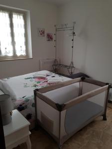 Posteľ alebo postele v izbe v ubytovaní Bed & Breakfast La Tana dei Sognatori