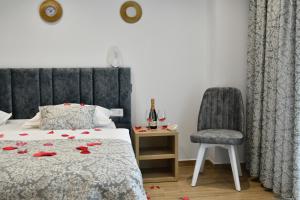 Postel nebo postele na pokoji v ubytování Elite Hotel