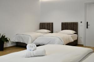 Postel nebo postele na pokoji v ubytování Elite Hotel