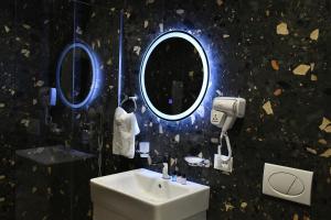 Koupelna v ubytování Elite Hotel