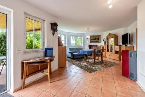 a living room with a couch and a table at Ferienwohnung Alexandra in Rheinfelden