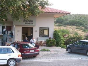 a group of cars parked outside of a hotel at Avaton Hotel in Lygourio