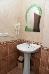 Koupelna v ubytování Kvariati Residence + 37 fotografií