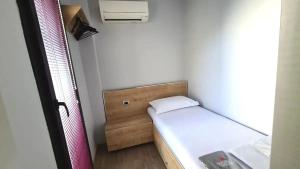 Un pat sau paturi într-o cameră la Galata nazapart