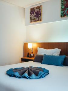 Cama ou camas em um quarto em ONOMO Hotel Rabat Terminus