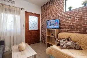TV a/nebo společenská místnost v ubytování Pepe home