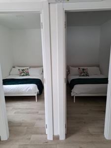 Posteľ alebo postele v izbe v ubytovaní A Casiña do Antonio