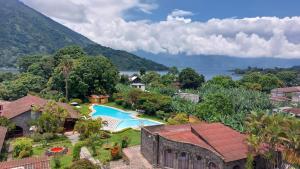 an aerial view of a resort with a swimming pool at Hotel Tiosh Abaj in Santiago Atitlán