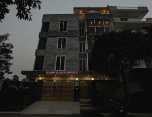 a building with a sign on the front of it at Townhouse 22956 Hotel Grand Residency in Greater Noida