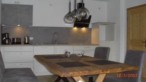 Kuchyň nebo kuchyňský kout v ubytování Ferienlodge Karwendelblick