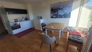 Kuchyň nebo kuchyňský kout v ubytování Apartment Lindenberg FEWO