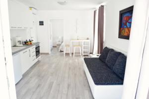 Kuchyň nebo kuchyňský kout v ubytování Rab apartments AURORA