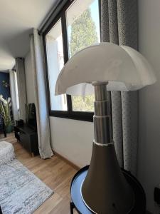 Кровать или кровати в номере Le grand clocher de Cassis