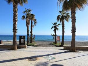 Zdjęcie z galerii obiektu Evans Realty AN 1ª línea playa & Piscina & Tenis w mieście Algarrobo-Costa