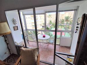 Zdjęcie z galerii obiektu Evans Realty AN 1ª línea playa & Piscina & Tenis w mieście Algarrobo-Costa