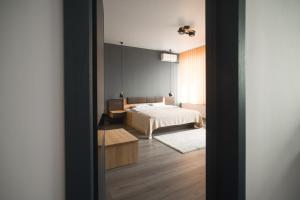 Ліжко або ліжка в номері Si-Yo hostel