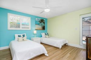 Giường trong phòng chung tại Lulu's Crescent Cottage #2 +64 ảnh