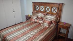 Säng eller sängar i ett rum på Bombal Apart