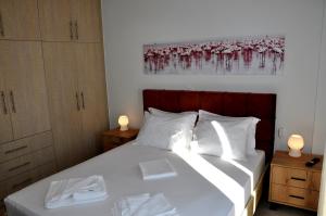Postel nebo postele na pokoji v ubytování Alkioni's Nest Apartments