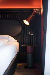 Postel nebo postele na pokoji v ubytování Hotel Miro'