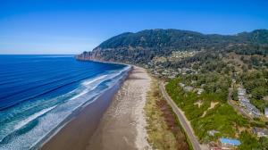 an aerial view of the beach and ocean at Cute Manzanita Beach House MCA 749 - Meredith Lodging in Manzanita
