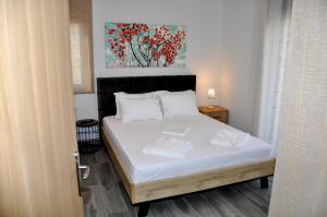 Postel nebo postele na pokoji v ubytování Alkioni's Nest Apartments