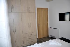 Postel nebo postele na pokoji v ubytování Alkioni's Nest Apartments
