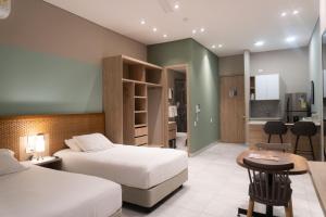 Postel nebo postele na pokoji v ubytování FR Hotel
