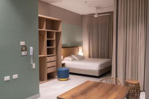 Postel nebo postele na pokoji v ubytování FR Hotel