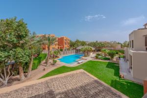an aerial view of the backyard of a house with a swimming pool at Beautiful Cosy 3 bedroom townhouse in South Marina in Hurghada