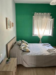 Postel nebo postele na pokoji v ubytování ZeusPlace Akti Platamonas