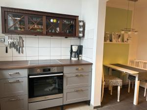 Nhà bếp/bếp nhỏ tại Alte Küsterei Hohen Mistorf +18 ảnh