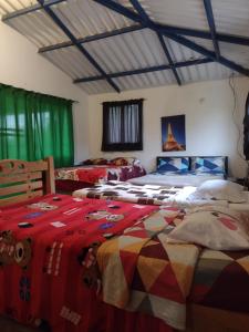 Voodi või voodid majutusasutuse Finca exclusividad familiar o grupo de amigos capacidad hasta 12 personas calles en placa huella, caminata ecológica toas