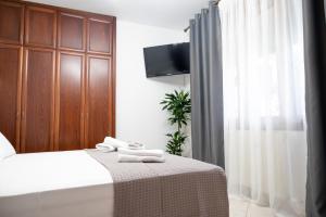 Ένα ή περισσότερα κρεβάτια σε δωμάτιο στο Seaside Guesthouse +39 φωτογραφίες